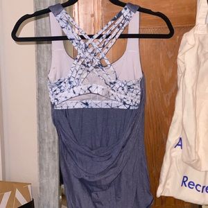 Lululemon workout tank with open back and cross-straps on back of bra